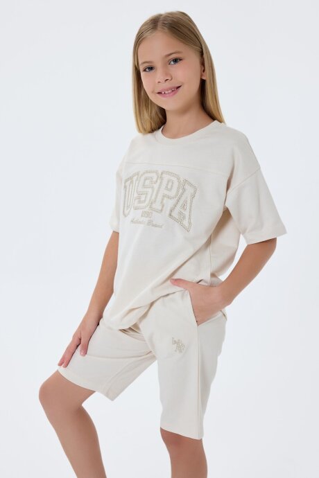 U.S. Polo Assn. Kız Çocuk Bisiklet Yaka Nakışlı Yazlık Regular Fit Krem Bermuda Takım US2527-C-V4